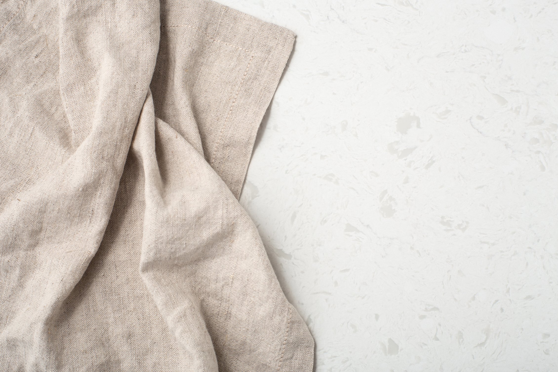 Linen tablecloth on marble kitchen table